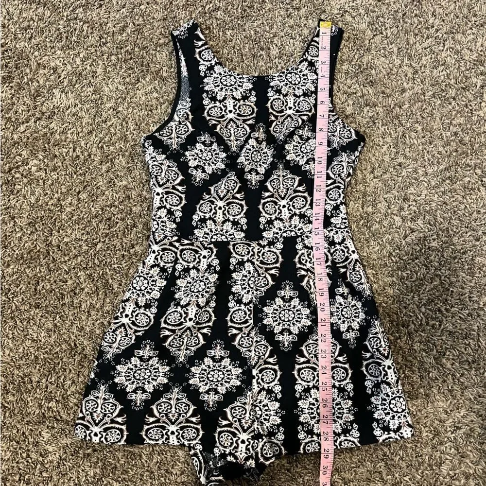 Lush  romper one piece Size small fun all over print sleeveless date